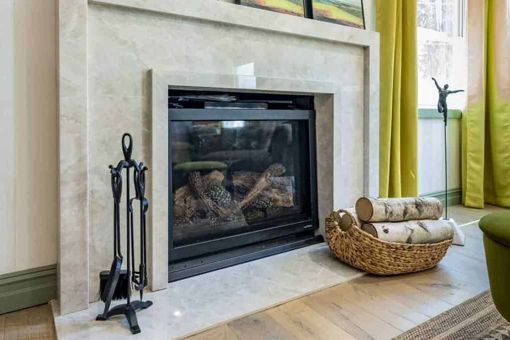 fireplace-with-basket-of-logs-living-room