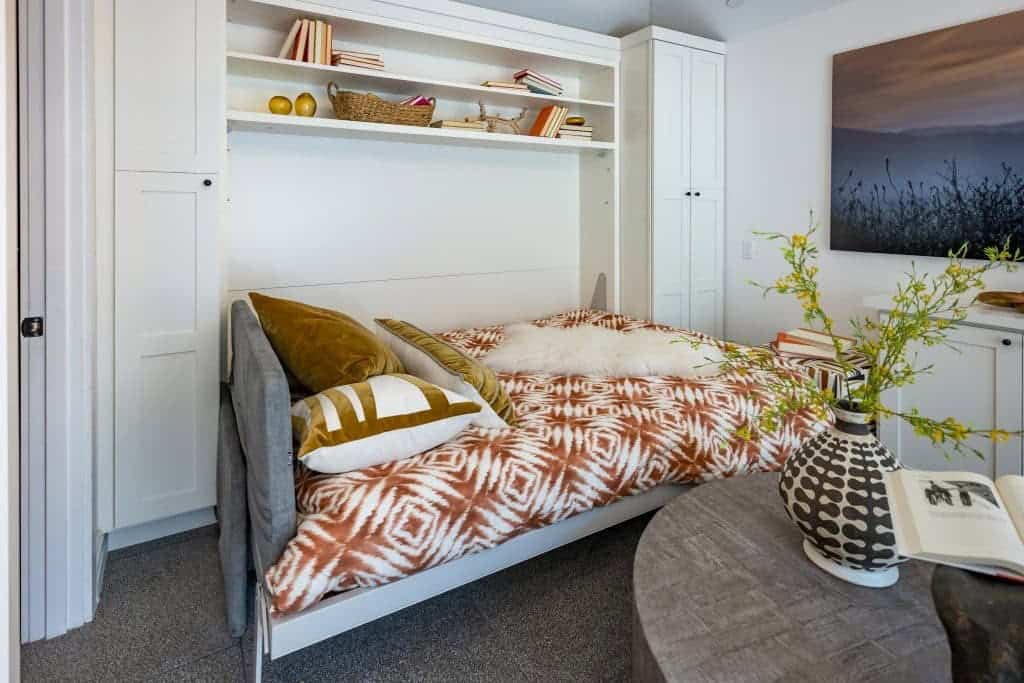 neatly-arranged-room-with-pull-out-bed