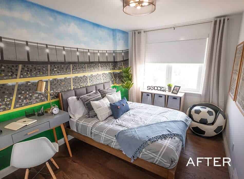 Soccer-themed bedroom with a stadium mural, cozy bed, desk, and a soccer ball-shaped chair