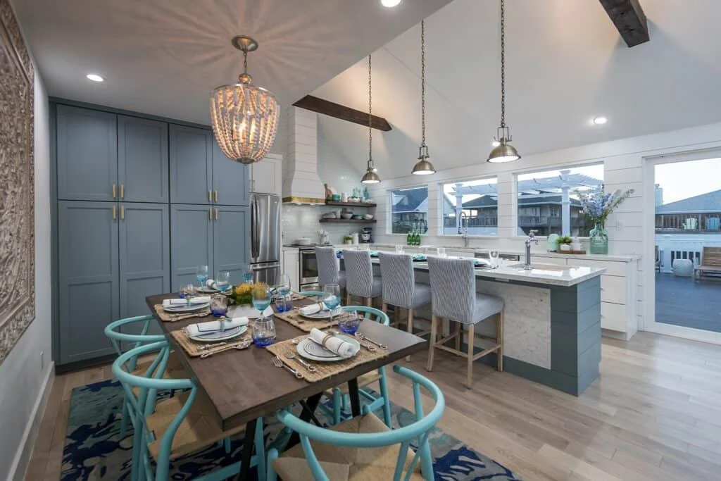 brother vs brother reveal team drew bright blue kitchen chairs and open concept floorplan, kitchen design styles