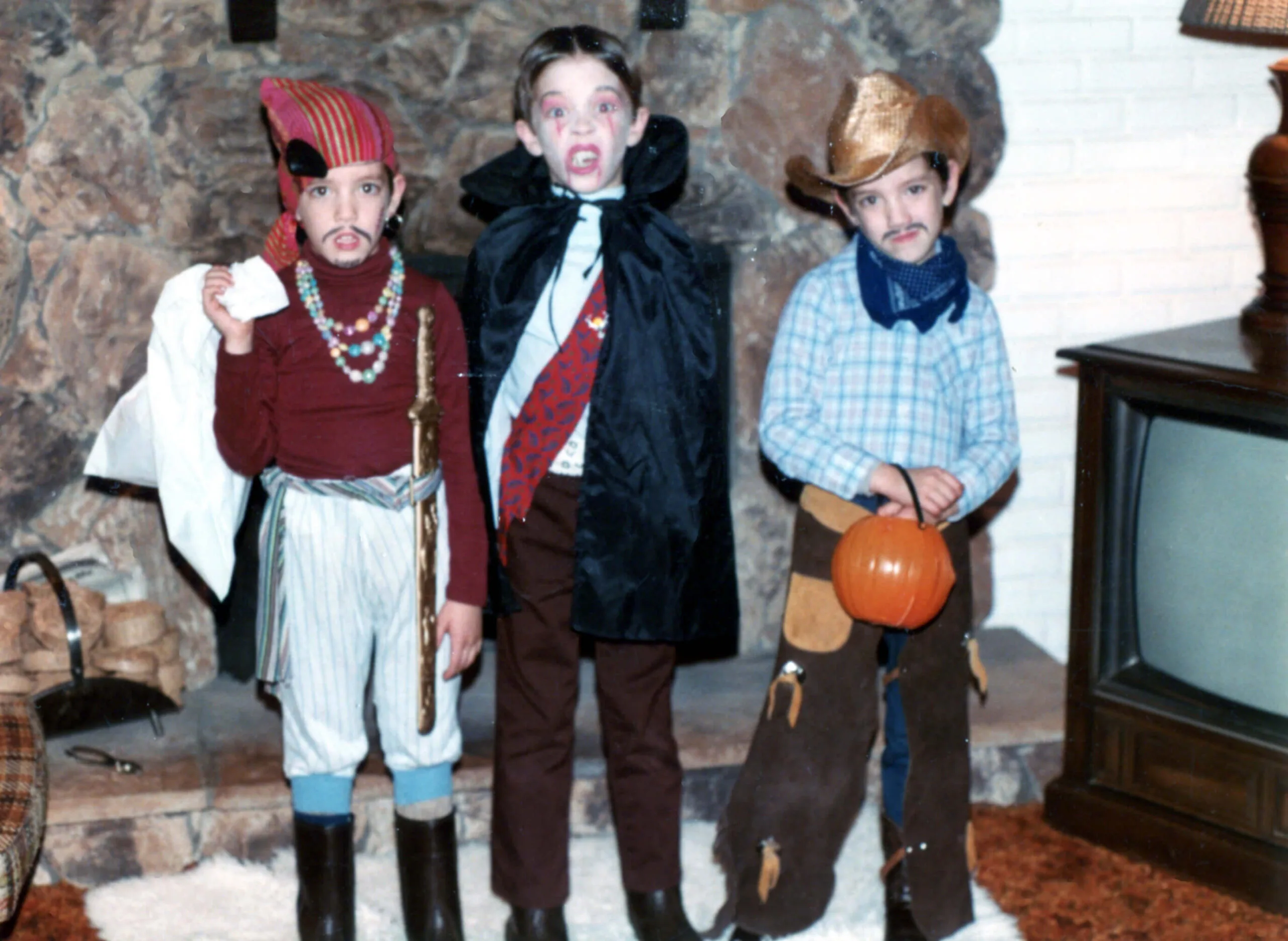 vampire, cowboy, and pirate halloween outfits