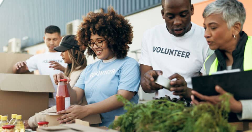 what is giving tuesday? volunteers packing bags for charity