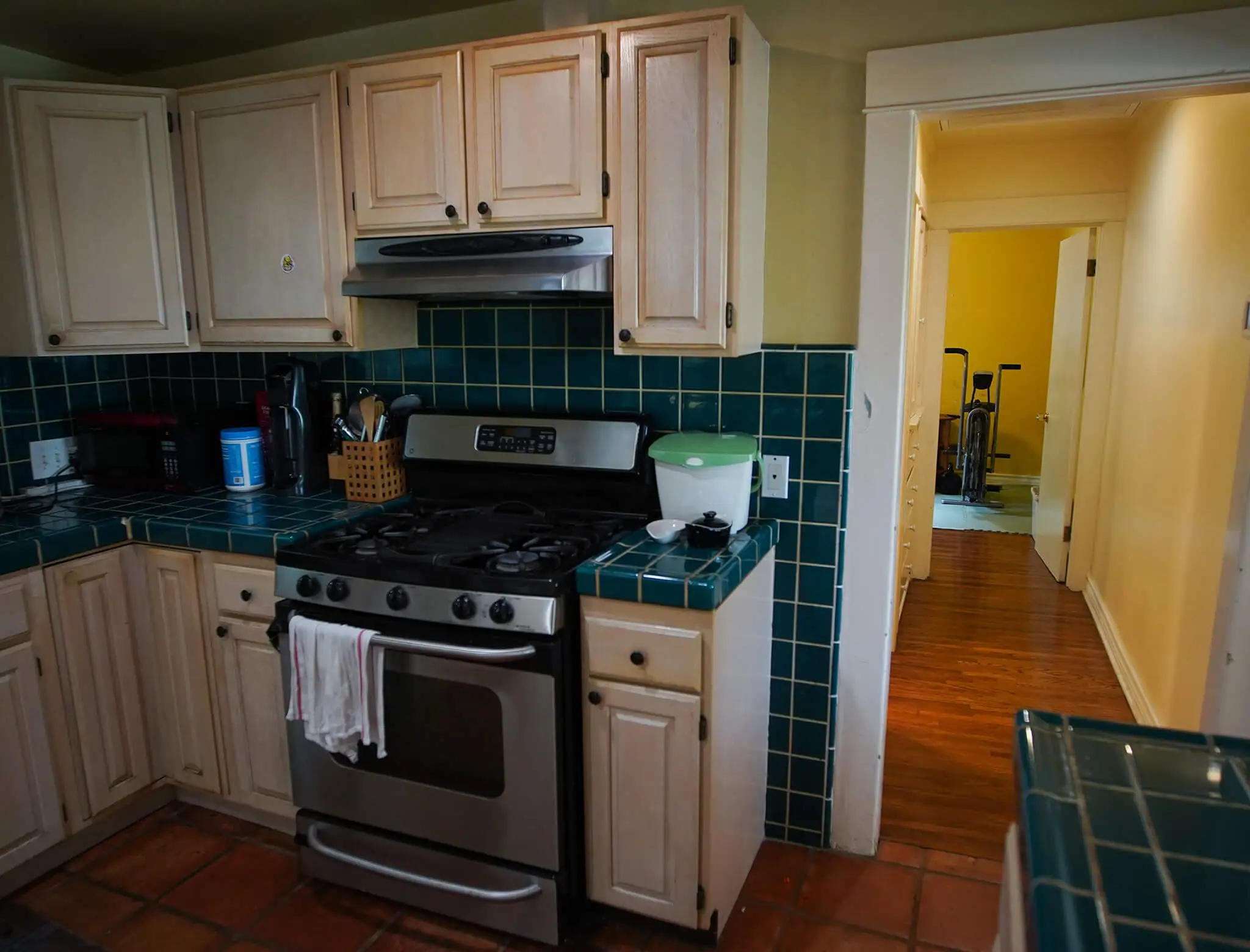 dark and dingy kitchen with outdated appliances