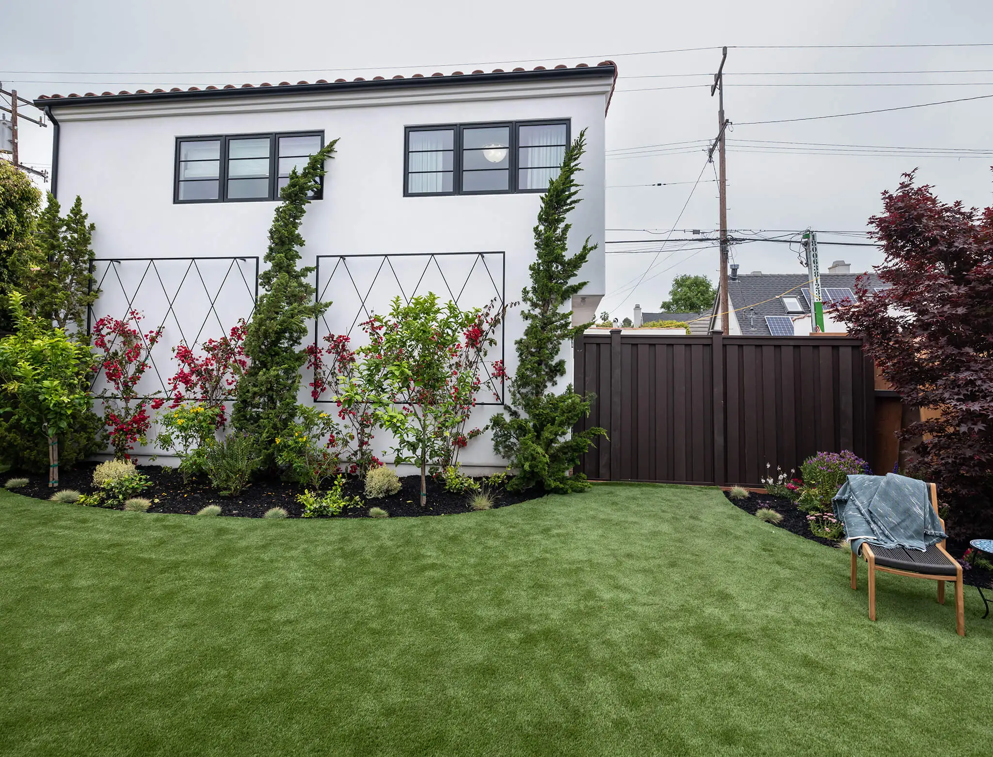 don't hate your house mom and dad beautiful backyard full of flowers and grass