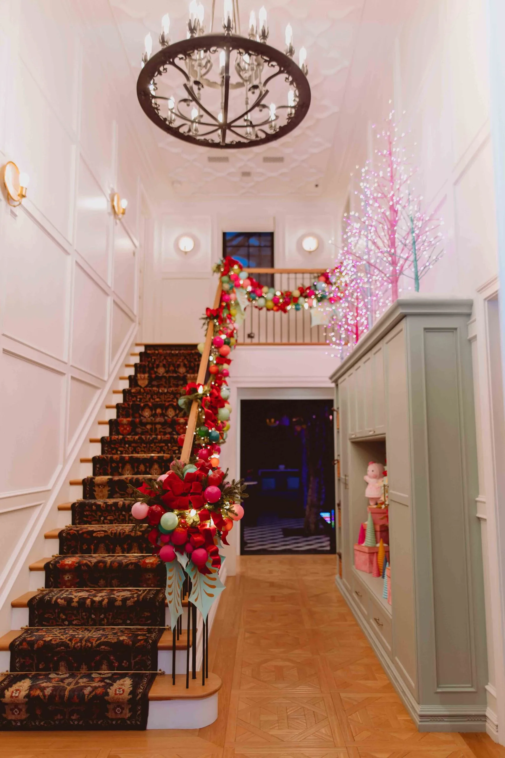 jonathan scott and zooey deschanel's entryway decorated for the holidays