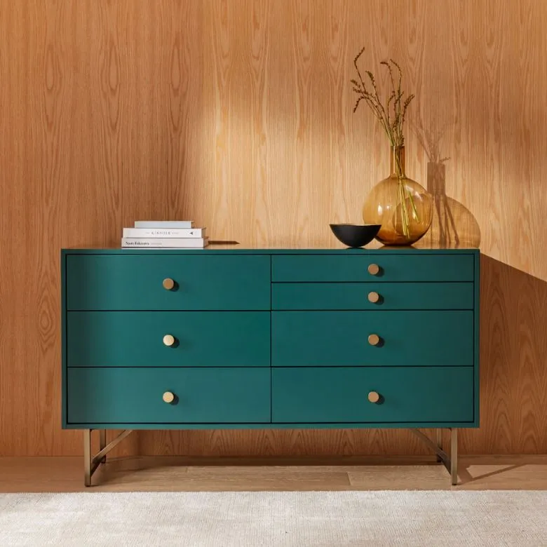 green 7-drawer dresser with gold accents