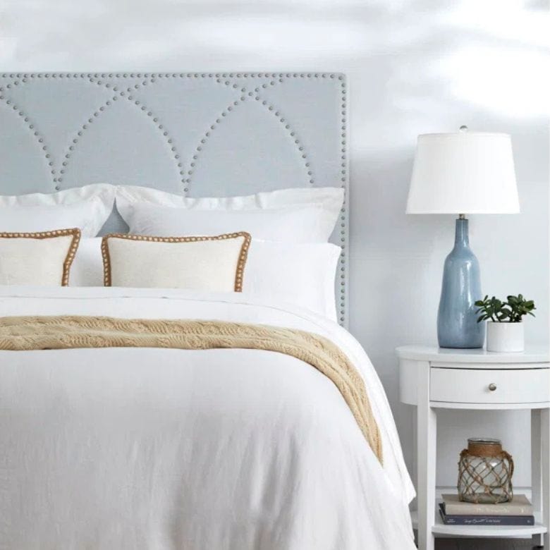 light blue studded headboard