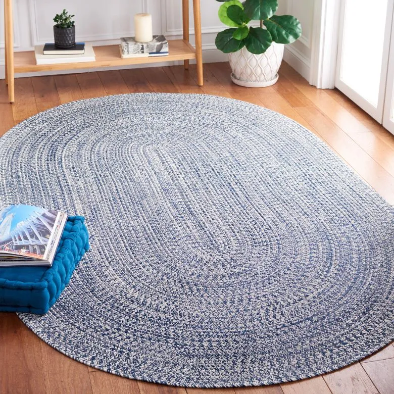 oval dark blue and ivory hand woven rug